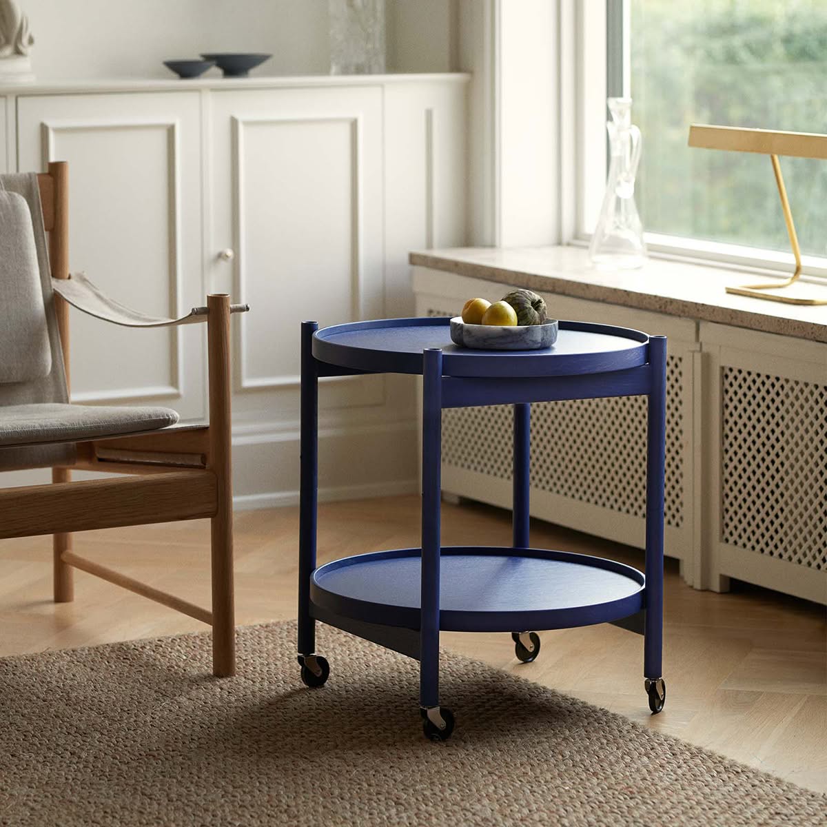 The indigo blue Tray Table designed by Hans Bølling