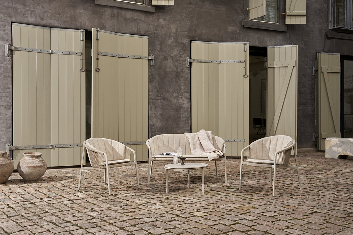 Vipp Lagrasse outdoor furniture arranged as a complete lounge set, demonstrating the collection's flexibility for small spaces