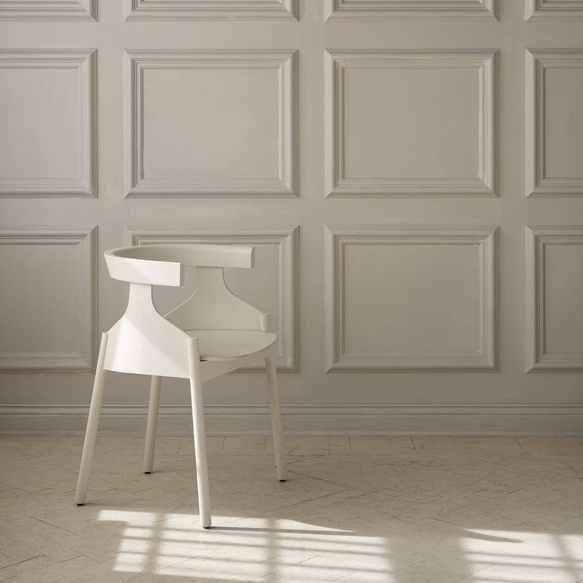 Howdoyoudo chair positioned in modern boardroom setting showcasing professional furniture application