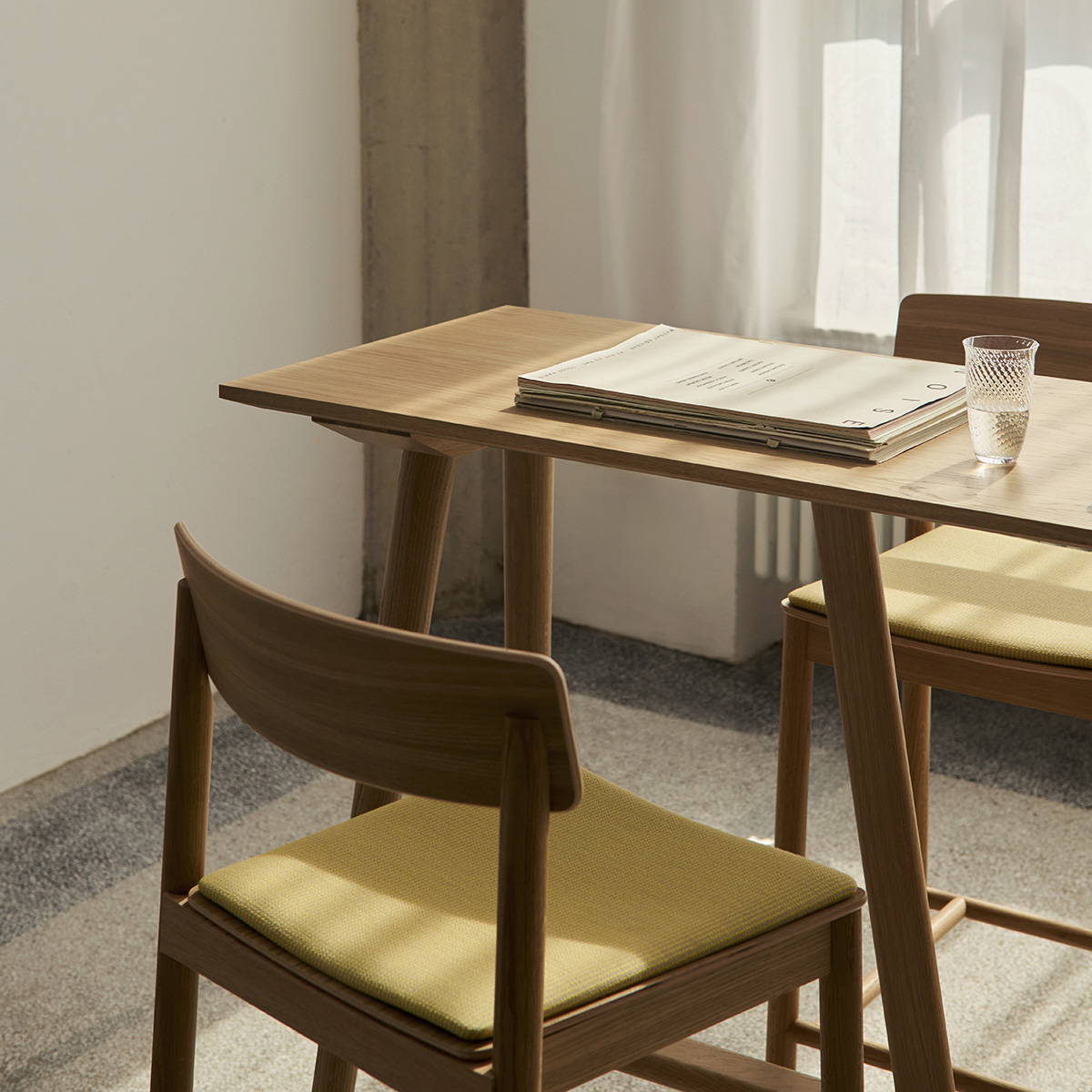 In Between counter table smoked oiled oak with optional metal footrest protection high traffic areas