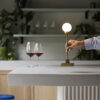 Snowball_portable_table_brass_on-bar_hand_northern_ph_sara-spilling | ScandinavianDesign.com