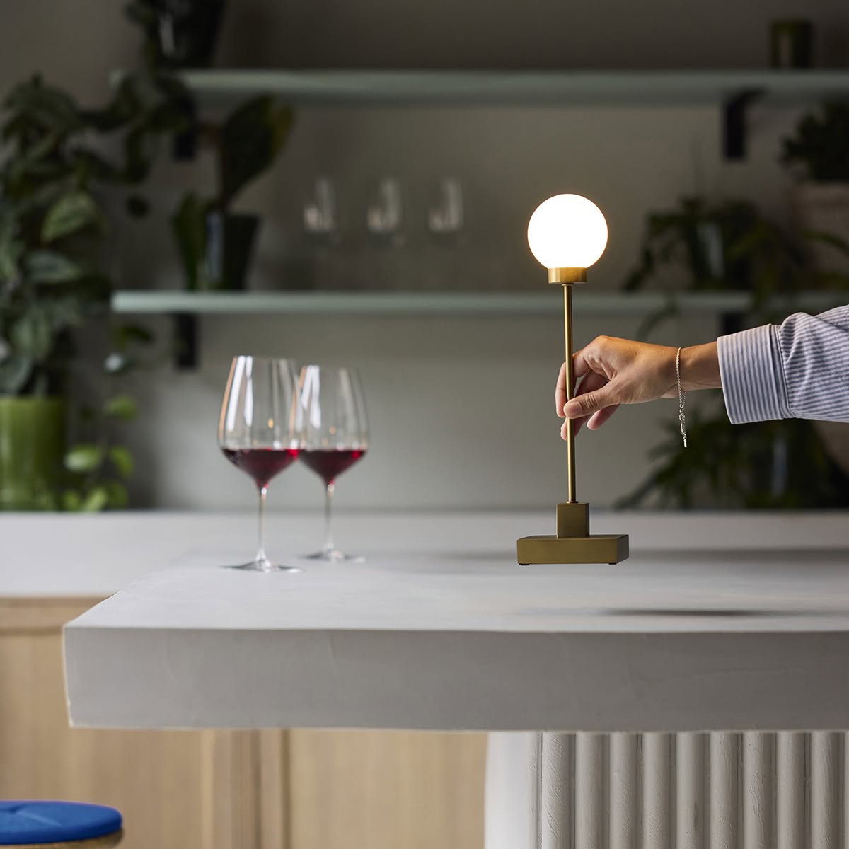 Snowball_portable_table_brass_on-bar_hand_northern_ph_sara-spilling | ScandinavianDesign.com