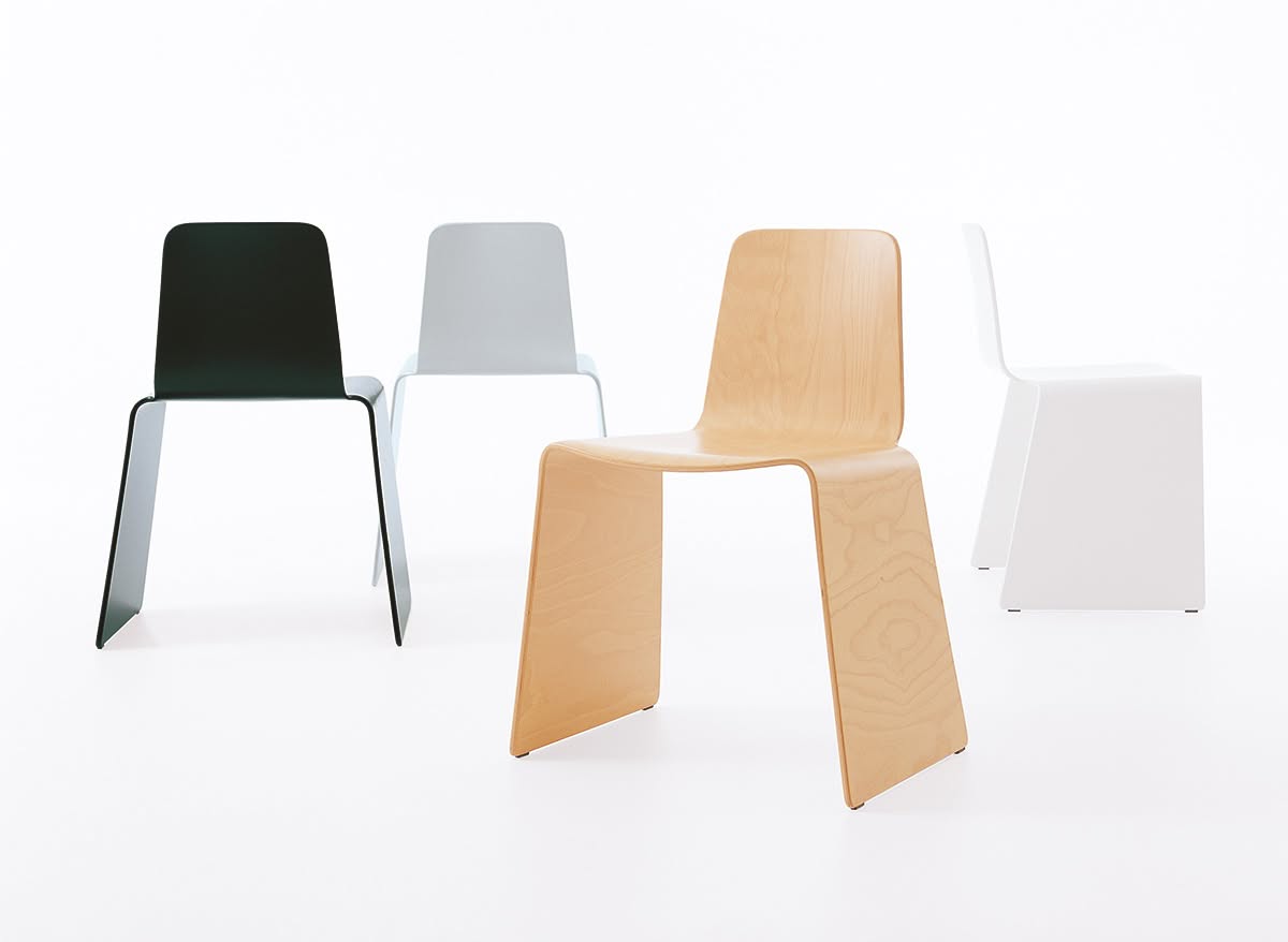 NXT is a stackable chair in compression moulded beech by Peter