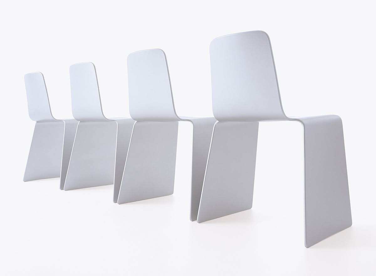 NXT is a stackable chair in compression moulded beech by Peter NXT is a stackable chair in compression moulded beech by Peter