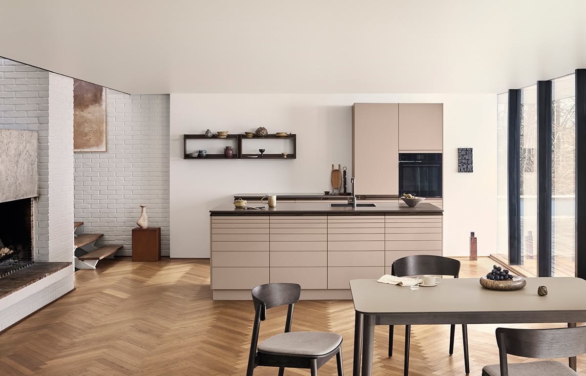 Kvik Align kitchen range by Rikke Frost displaying modular units in clay tone with oak accents