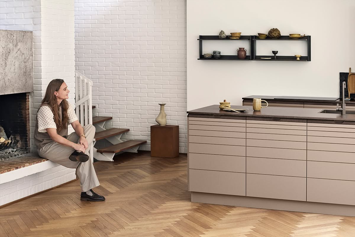 Align kitchen cabinetry with matte recycled PET surface and FSC certified oak handle integration