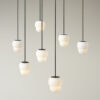 Fall pendant lamp by John Astbury for Pholc, opal glass globe with straight-cut silhouette