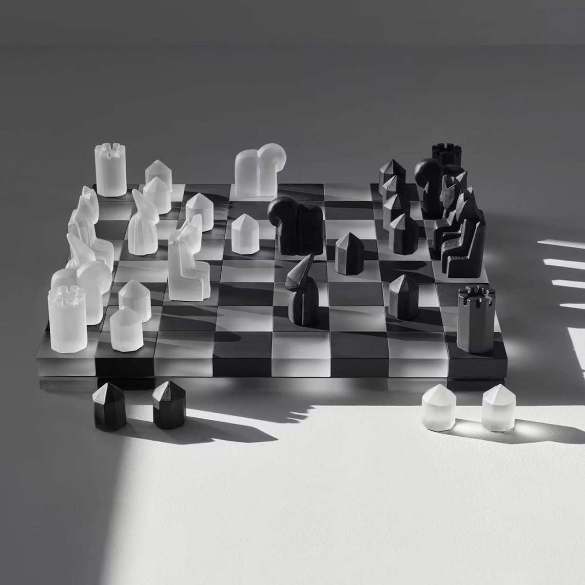 Orrefors and Jay3lle glass chess board, black and clear squares on thick glass base with oak feet