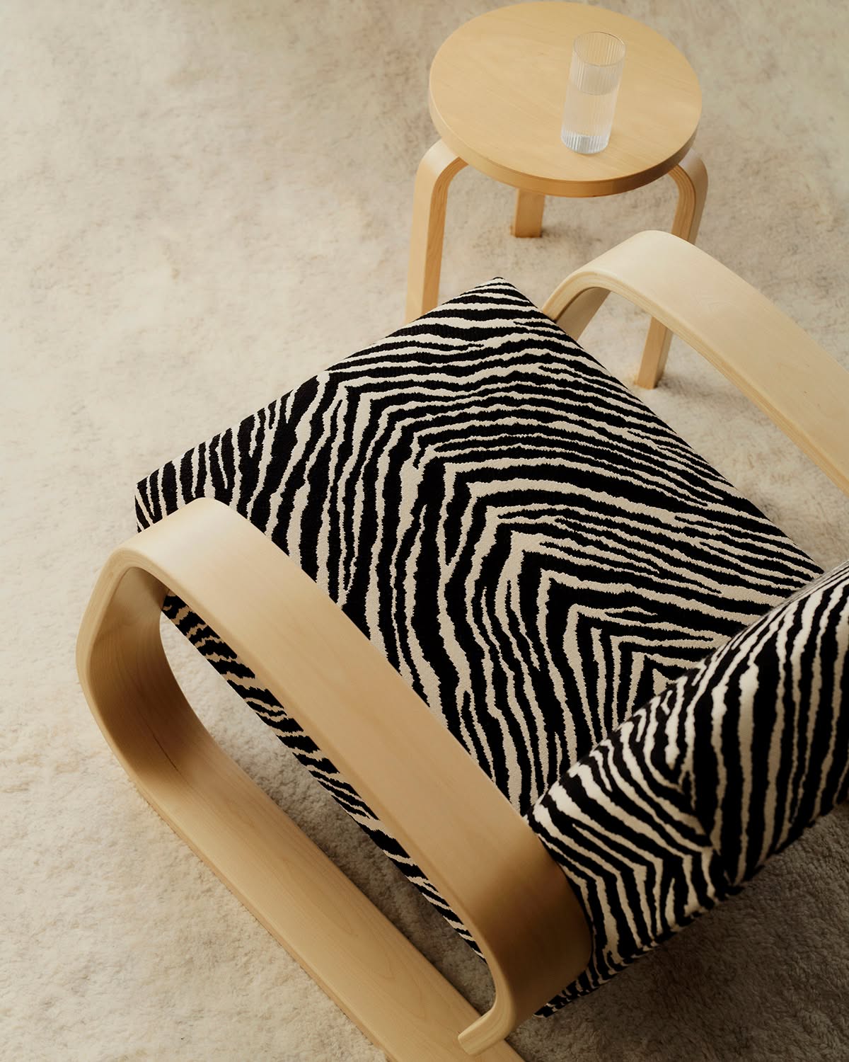 Artek Zebra 2026 in situ Armchair 400 Black and white Zebra Stool 60 birch 2 master